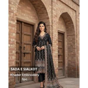 Black suit with rich orange/rust/brown tone embroidery, especially along the borders.  Ember Glow Khaddar Embroidered 3pc